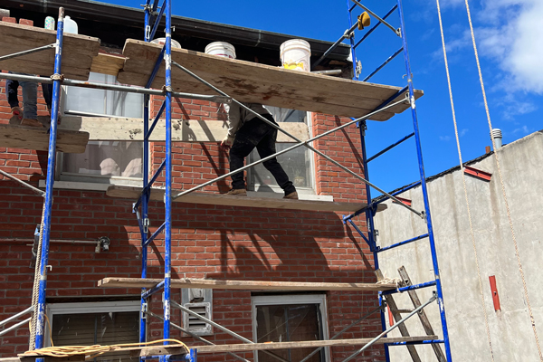 Man working on scaffolding